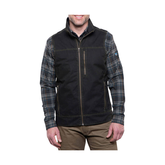 Black zip-front vest over a plaid long-sleeve shirt, shown on a model from the shoulders to mid-thigh