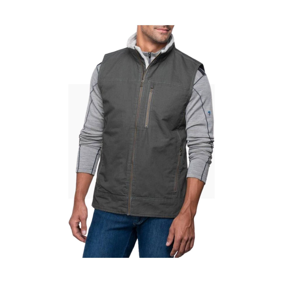 Dark gray sleeveless zip-front vest over a light gray long-sleeve shirt