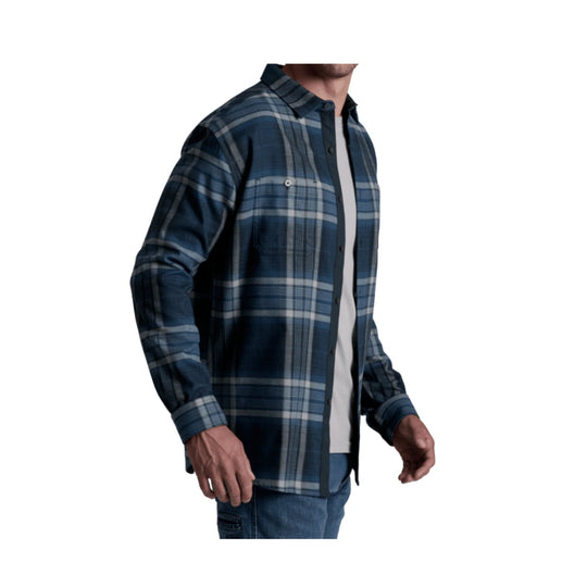 Blue plaid long-sleeve button-up shirt worn open over a white T-shirt