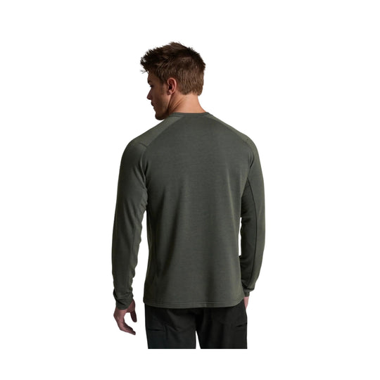 Dark olive long-sleeve crew shirt shown from the back on a model