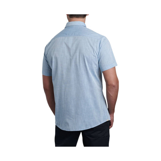 Light blue short-sleeve button-up shirt shown from the back on a male model