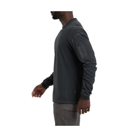 Black long-sleeve crewneck shirt with a zip pocket on the upper sleeve and Kuhl logo on the sleeve