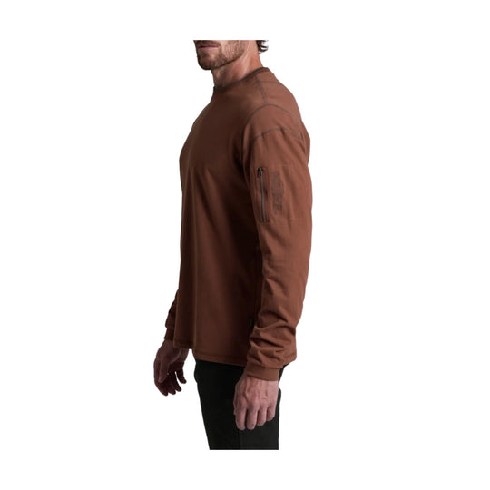Brown long-sleeve crewneck shirt with a zip pocket on the upper sleeve