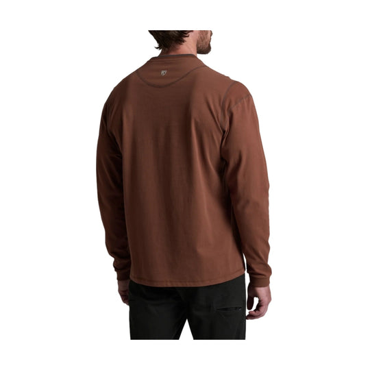Brown long-sleeve crewneck shirt shown from the back on a male model