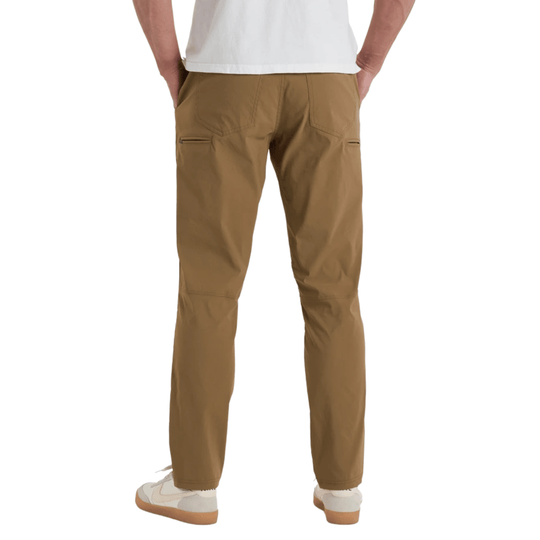 Rear view of tan cargo hiking pants with zip pockets