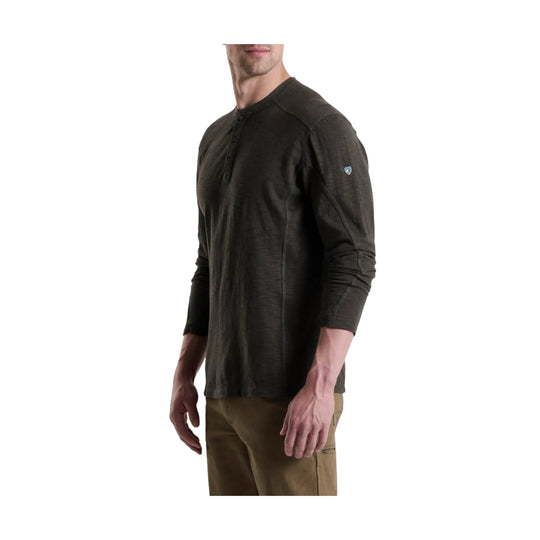 Dark long-sleeve henley shirt with a button placket and rolled sleeves