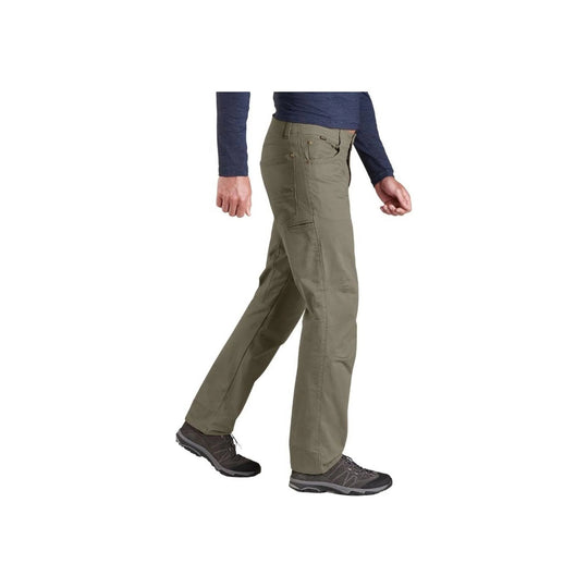 Olive hiking pants with cargo pockets, shown on a model wearing dark shoes