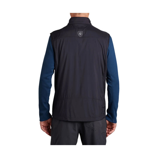 Black zip-front vest shown from the back over navy long sleeves