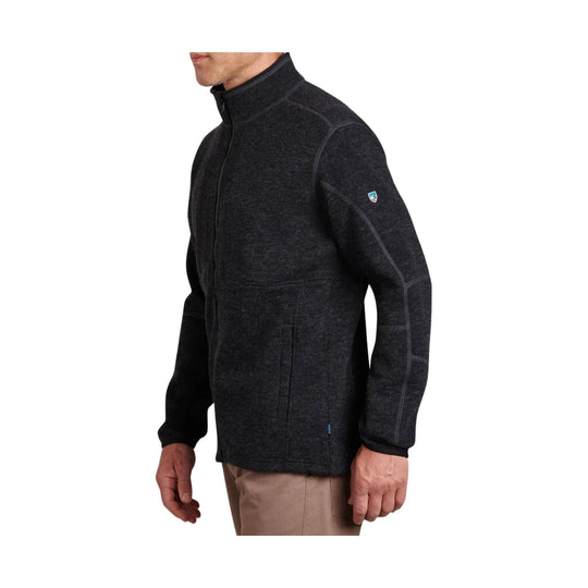 Dark zip-front fleece jacket with high collar and long sleeves, shown in side view