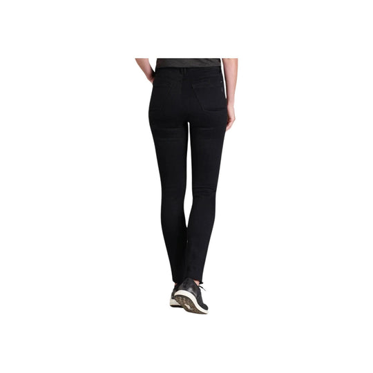 Black skinny jeans shown from the back with rear pockets and tapered legs