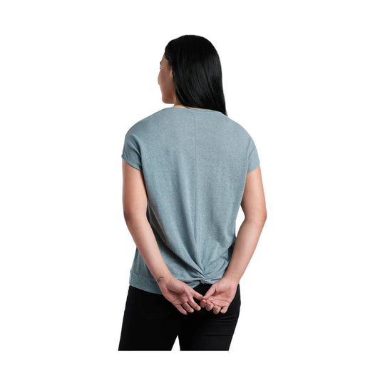Woman wearing a heathered blue-gray short-sleeve T-shirt, shown from the back with a twisted hem detail