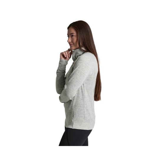 Light gray women’s turtleneck pullover shown in side profile