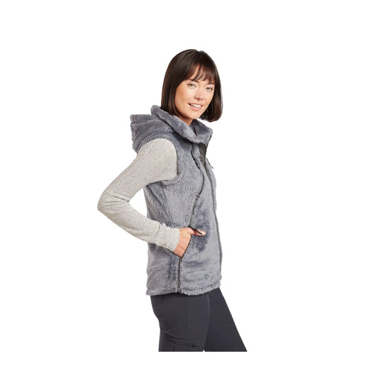 Gray sherpa fleece hooded vest worn over a light long-sleeve top