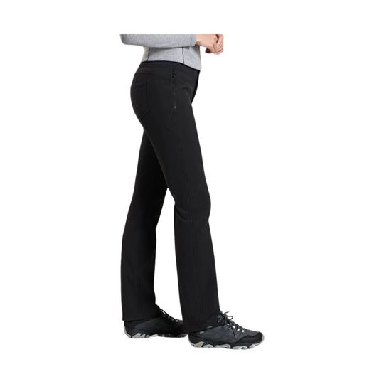 Black women’s softshell pants shown in side view
