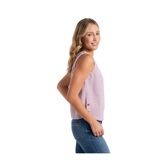 Light lavender sleeveless textured tank top with buttoned side hem, shown on a model with blue jeans