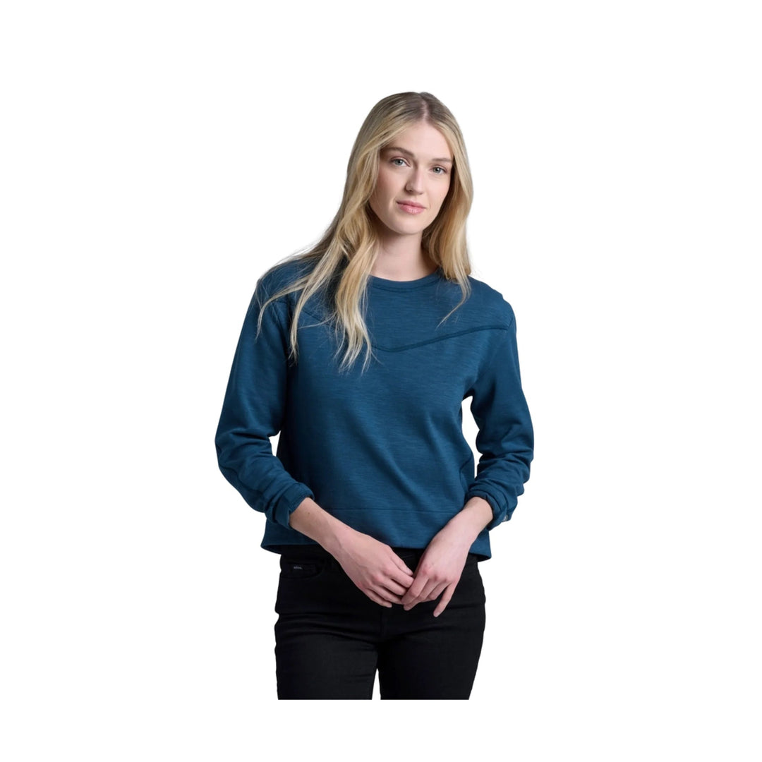 Blue crewneck long-sleeve sweatshirt with a curved seam detail across the chest