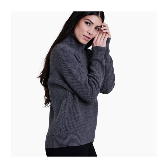 Charcoal ribbed turtleneck sweater shown in side view on a model