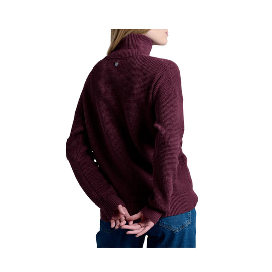 Burgundy turtleneck sweater shown from the back with long sleeves and blue jeans