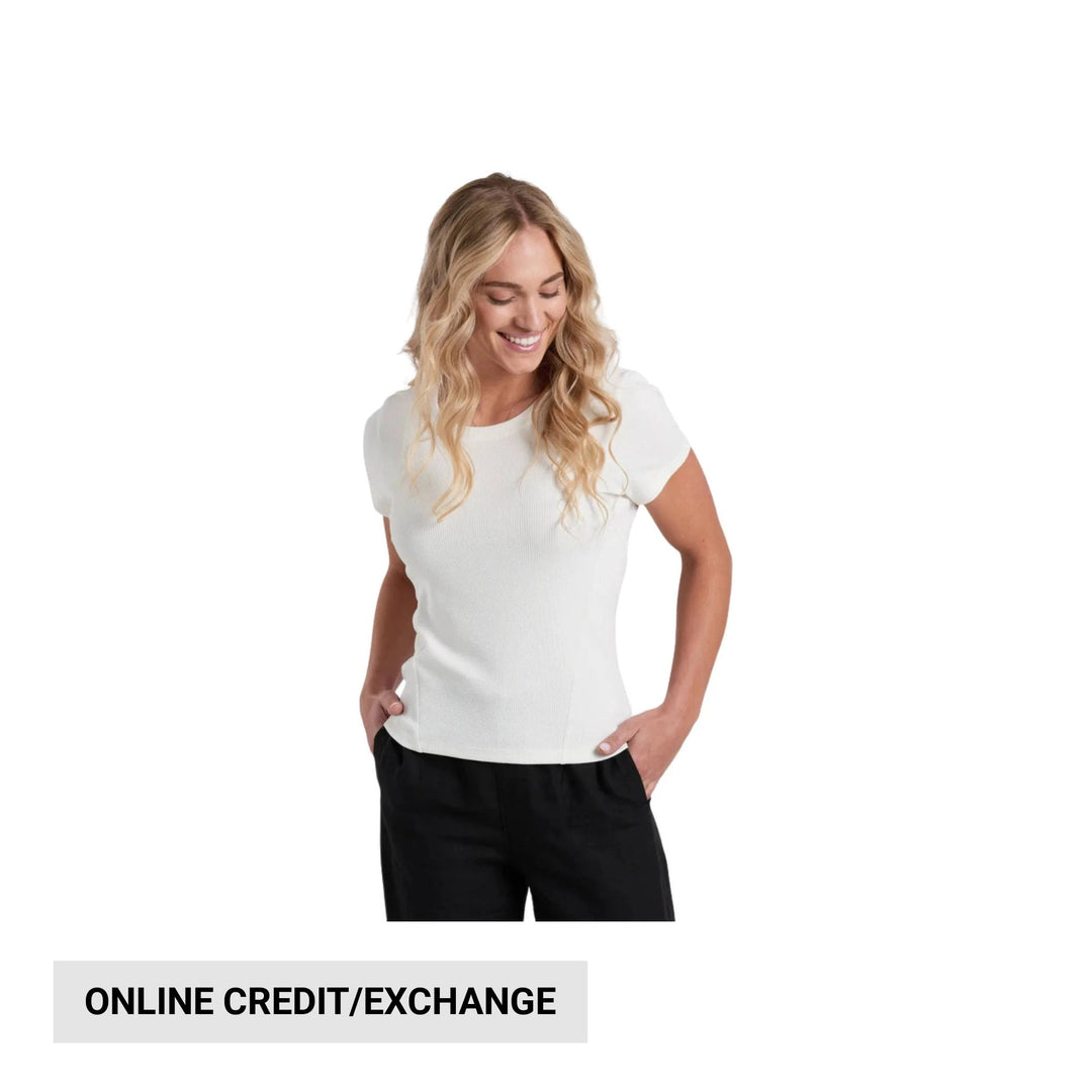 White short-sleeve knit T-shirt on a model with hands in pockets