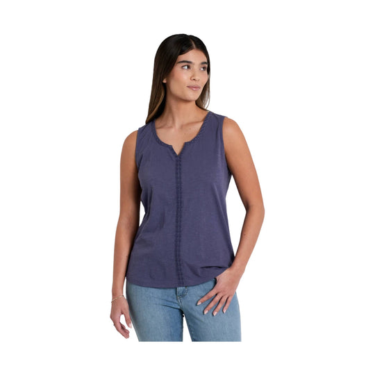Sleeveless purple V-neck tank top with lace trim and a rounded hem, worn with light blue jeans