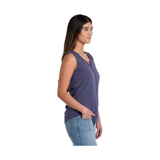 Sleeveless blue V-neck tank top shown in side view with light blue jeans