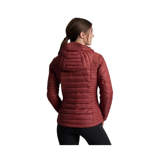 Rust red quilted hooded puffer jacket shown from the back