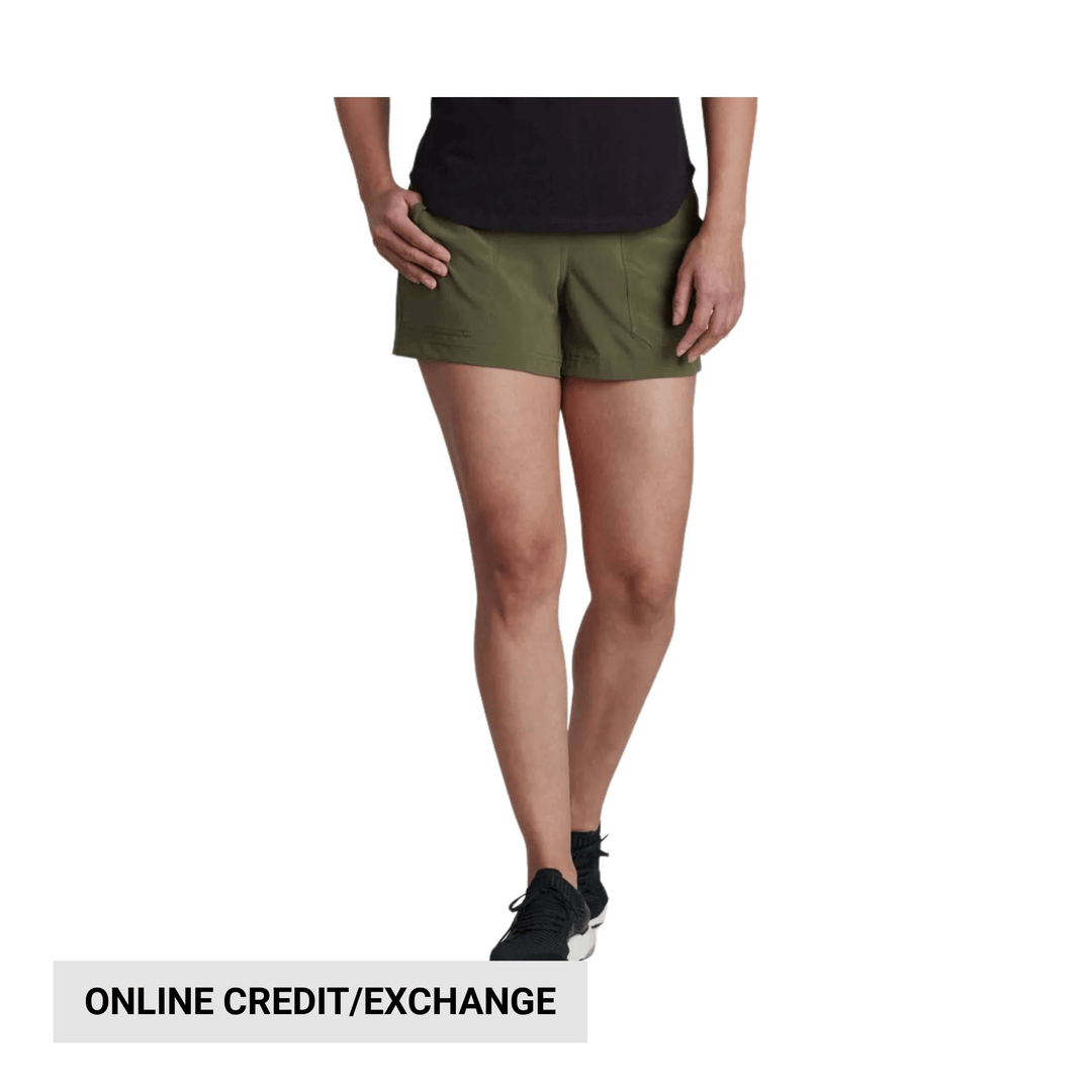 Olive green running shorts with black shoes on a model, with “ONLINE CREDIT/EXCHANGE” text at the bottom.