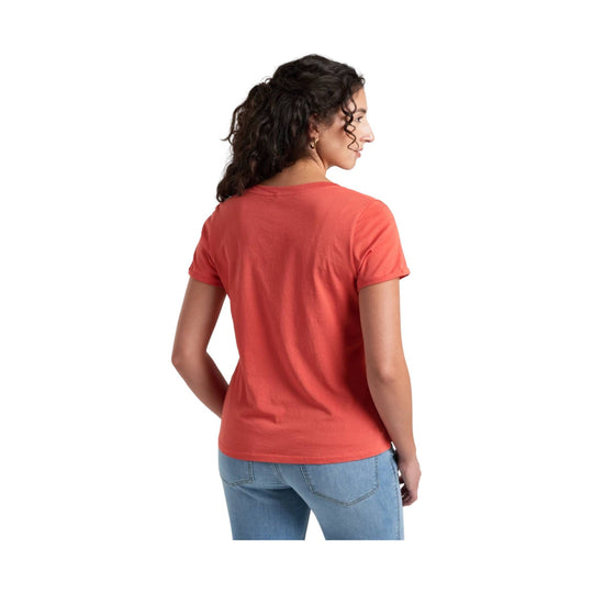Coral short-sleeve crewneck T-shirt shown from the back on a model