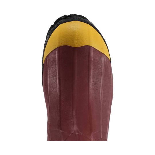Close-up of a red rubber boot with a yellow sole on a white background