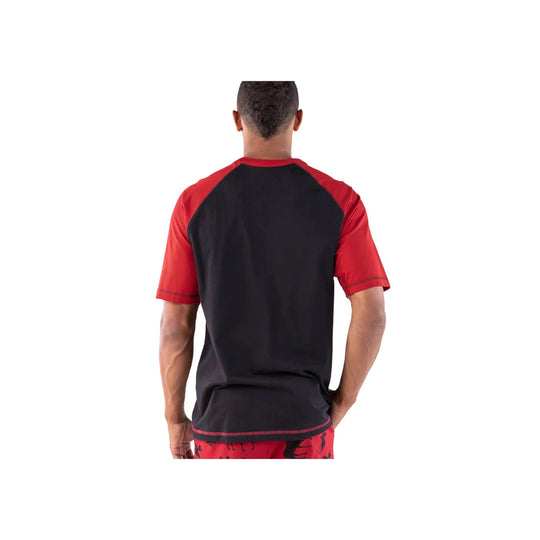 Black T-shirt with red raglan sleeves shown from the back