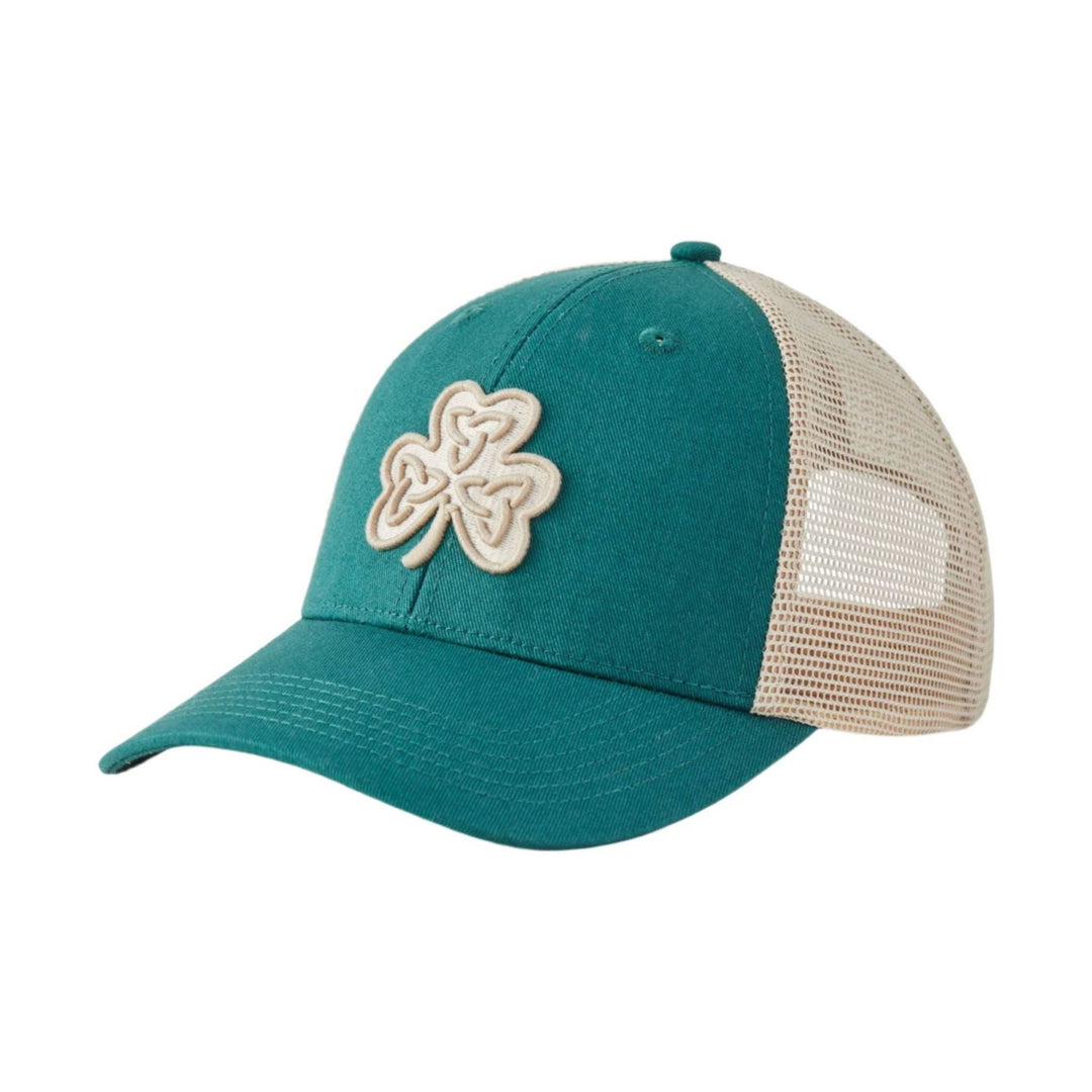 Teal and beige mesh trucker hat with a clover patch on the front