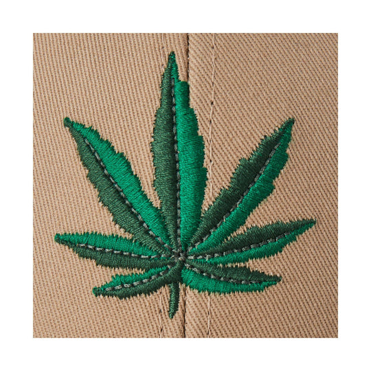 Embroidered green cannabis leaf on tan twill fabric