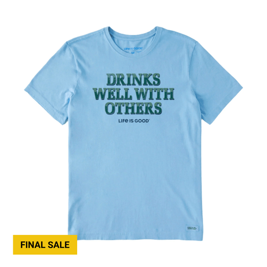 Light blue short-sleeve T-shirt with “DRINKS WELL WITH OTHERS” printed on the chest