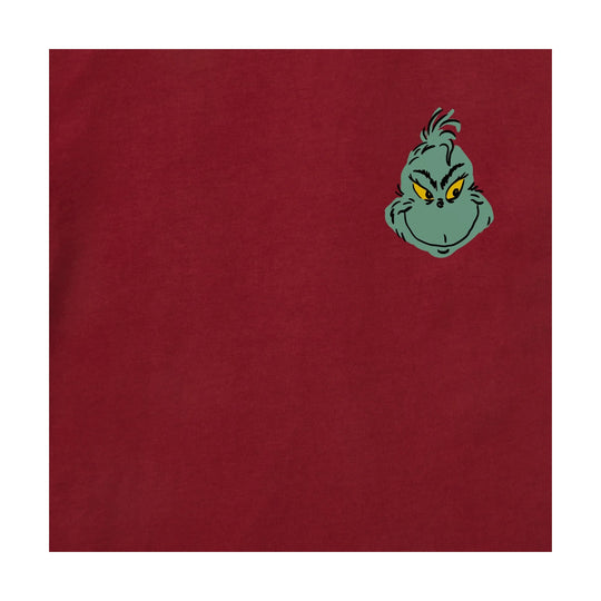 Red T-shirt with a small Grinch face graphic on the chest