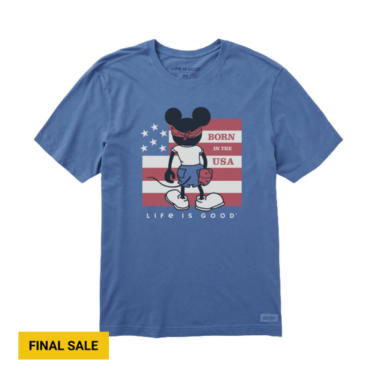 Blue graphic T-shirt with a cartoon mouse in front of a U.S. flag and the text “BORN IN THE USA”