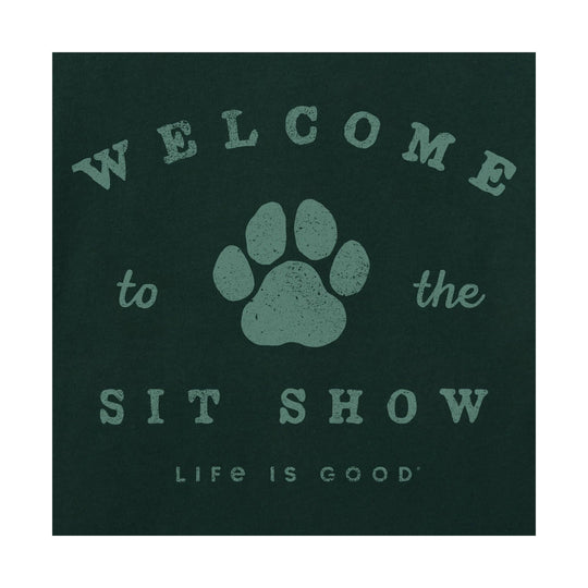 Dark green graphic T-shirt design with a paw print and the words “Welcome to the Sit Show”