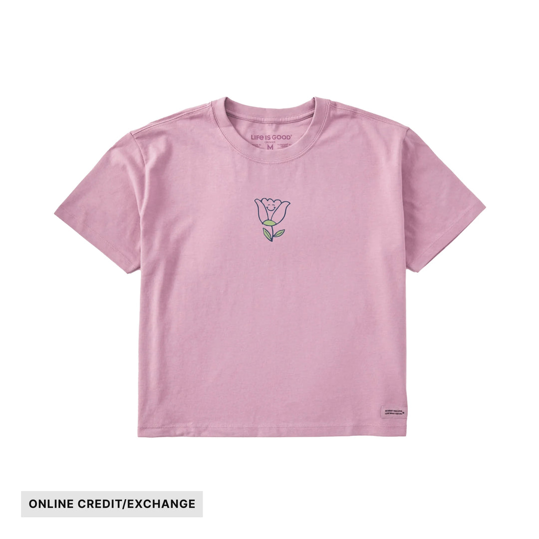 Pink short-sleeve boxy tee with a small tulip graphic on the chest