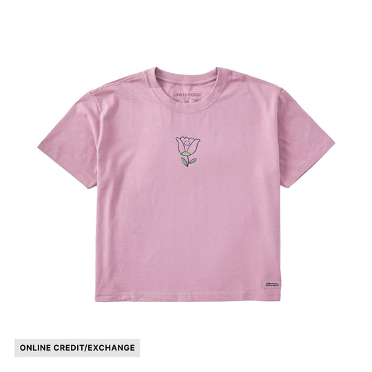 Pink short-sleeve boxy tee with a small tulip graphic on the chest
