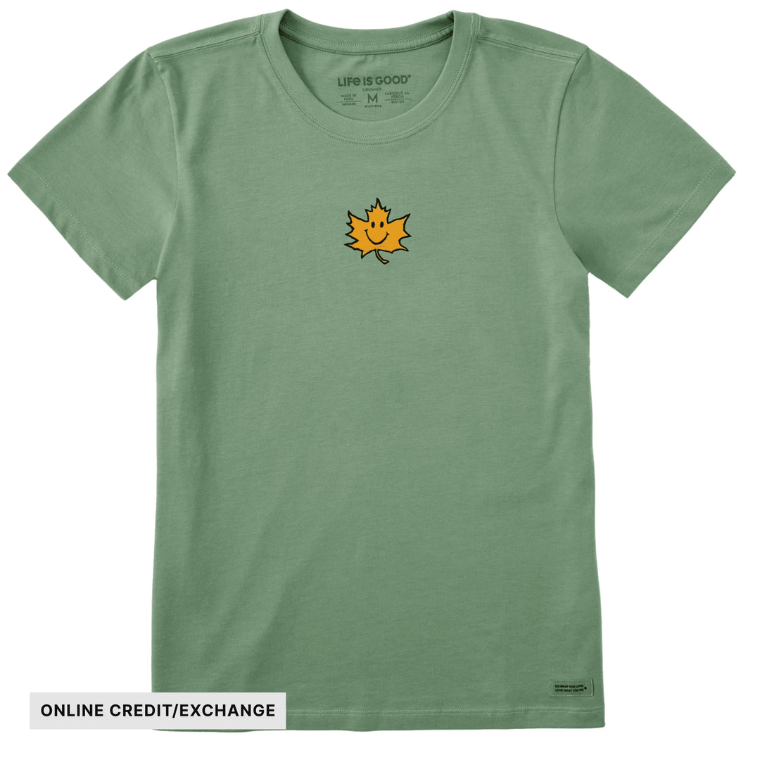 Green short-sleeve T-shirt with a small smiling maple leaf graphic and visible online credit/exchange label
