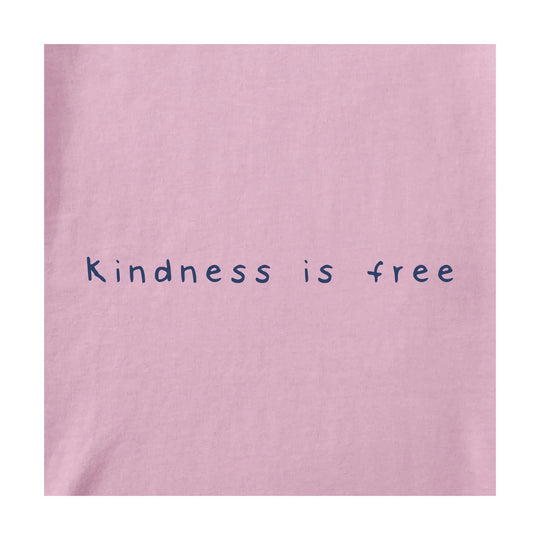 Pink graphic T-shirt with the text “Kindness is free” in dark blue lettering.