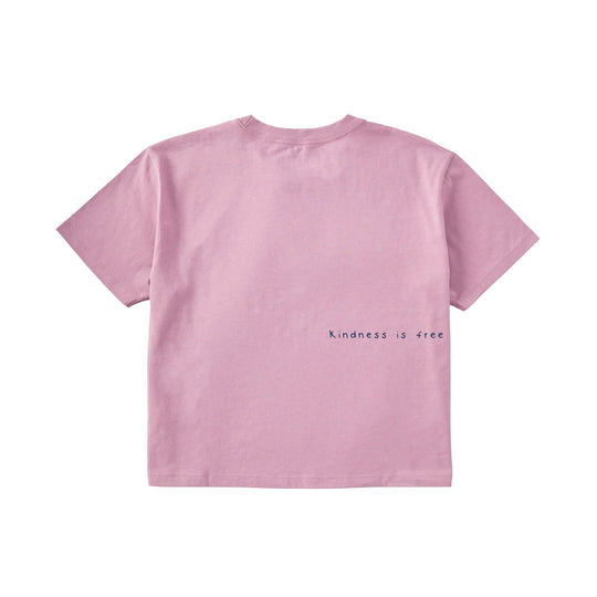 Pink boxy short-sleeve T-shirt with "kindness is free" printed on the lower front