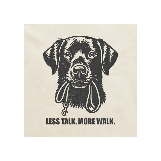 Black dog face graphic on a light shirt with the text "LESS TALK, MORE WALK."