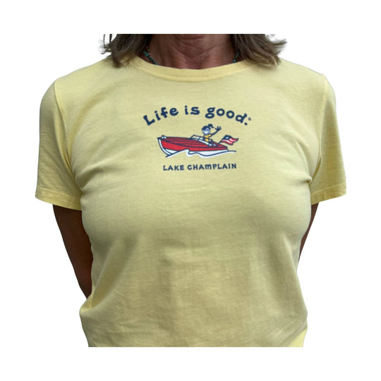 Sandy yellow short-sleeve T-shirt with a boat graphic and the text “Life is good.”