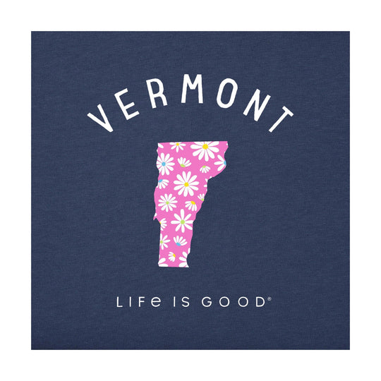 Dark blue T-shirt with arched Vermont text and a pink daisy-filled Vermont outline graphic
