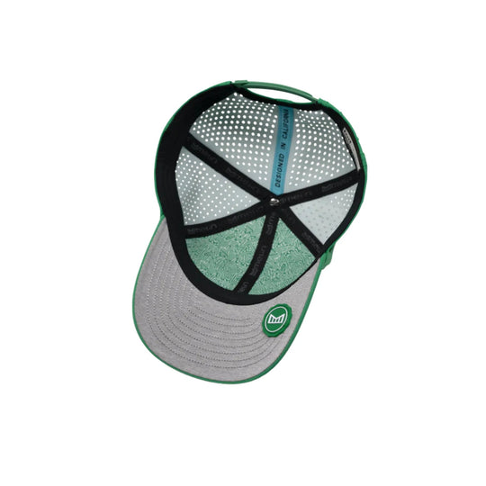 Gray and green baseball cap shown upside down, with perforated panels, patterned green underbrim, and a round front logo patch