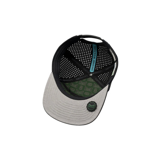 Black and gray mesh baseball cap with green patterned underbrim and a circular logo patch
