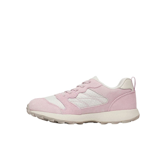 Pink and white kids' sneaker with suede panels, mesh side overlay, and a thick cream sole, shown in side view