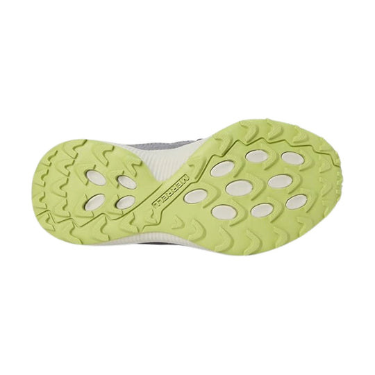 Lime green shoe outsole with oval cutouts and Merrell branding