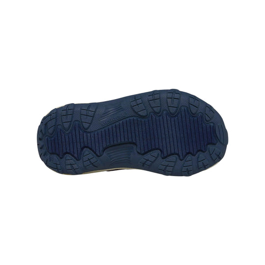 Navy shoe outsole with rugged tread and Merrell branding