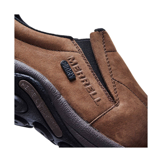 Brown suede slip-on shoe with black trim and a Merrell logo on the side